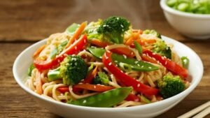 this Noodles with Veggie Stir-Fry recipe! Packed with fresh, colorful vegetables and savory noodles, this dish is healthy, quick, and ideal for weeknight dinners. Ready in under 30 minutes!