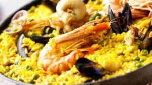 Seafood Paella: A Feast for the Senses and the Soul Ah, seafood paella—just saying the name makes my mouth water! This iconic Spanish dish is much more than just a meal. It’s a rich cultural experience, bursting with flavors, vibrant colors, and a sense of togetherness. Whether you’re a lifelong foodie, a home cook experimenting in the kitchen, or just someone looking for a healthier, tastier dinner option, seafood paella ticks all the boxes. But wait, before we get started, I’ve got two little treasures to share with you. First, if you're serious about making paella the authentic way, you need the right tools. Trust me, a good paella pan makes all the difference, and I’ve found one that’ll take your paella game to the next level. Click here to check it out (affiliate alert, but I only recommend the best!). Second, if you’re into healthy recipes, you’ll love this Fat-Burning Cookbook that’s packed with flavor-filled recipes like paella and more. Take a peek at it here! Now, grab your apron and get ready for a deep dive into all things paella. By the end of this, you’ll not only know how to make this dish like a pro, but you’ll also have healthier (and tastier) alternatives to make it your own. The Basics of Seafood Paella Where It All Began Paella hails from Valencia, Spain, and it’s much more than a dish—it’s a tradition. Historically, it was prepared outdoors, cooked over an open fire, and shared among family and friends. The word "paella" comes from the Old French "paelle," which means pan, so yes, the pan is kind of a big deal here. While paella has evolved with time, its essence remains the same—a harmonious blend of fresh ingredients cooked to perfection. Essential Ingredients (and Why They Rule) At its core, seafood paella is a simple dish. Yet, each ingredient plays a starring role. Here’s what you’ll need: Rice: Traditional paella calls for short-grain rice because it absorbs liquid without becoming mushy. Bomba rice is the star! Seafood: From prawns and mussels to squid and fish, seafood options are endless. And bonus—seafood is packed with omega-3 fatty acids. Saffron: This golden spice is non-negotiable. It gives the rice its signature color and a subtle floral flavor. Vegetables: Bell peppers, tomatoes, and peas are common additions that boost color and nutrition. Stock: Robust seafood or chicken stock is key to infusing that irresistible depth of flavor. Step-By-Step Guide to Making Seafood Paella Prep Your Ingredients: Chop your veggies, clean your seafood, and measure out the perfect ratio of rice to broth (usually 1 cup of rice to 2.5 cups of stock). Sear Your Seafood: Heat your paella pan (did you check out the one I linked before? 😉) with olive oil. Quickly sear your seafood, then set it aside—it’ll finish cooking later. Build the Base: Sauté onions, garlic, and tomatoes in olive oil. Stir in paprika and saffron for that dreamy flavor. Add Rice & Stock: Mix the rice into the base and pour your stock over. Pro Tip: Never stir paella once you’ve added the liquid. Let the rice cook undisturbed to develop the coveted crispy "socarrat" layer at the bottom. Arrange Seafood: Scatter your seafood back into the pan as the rice cooks—this helps them stay tender and locks in all that juicy flavor. Rest & Serve: Once the liquid is fully absorbed and the rice is cooked, remove from heat, cover with foil, and let it rest for 5 minutes before serving. Voila, you’ve just made paella like a true Spaniard! Health Benefits of Seafood Paella A Nutritional Powerhouse Seafood is a low-calorie, high-protein champ. Mussels are packed with iron, prawns are rich in selenium, and squid brings zinc to the plate. All that goodness, and none of the guilt! The Mediterranean Difference Seafood paella is rooted in the Mediterranean diet, which is hailed as one of the healthiest in the world. With its heart-healthy fats, lean proteins, and fresh produce, this dish nourishes your body and soul. Tips to Make It Healthier Use brown rice for extra fiber and nutrients. Swap out regular olive oil for extra-virgin olive oil to maximize antioxidants. Load up on veggies like zucchini, asparagus, or artichokes for added vitamins. Reduce sodium by opting for low-sodium stock or making your own. Tools of the Trade No great paella is complete without the right tools. A traditional paella pan ensures even cooking and perfect texture. And if you’re serious about recreating that authentic experience, a paella burner is a worthy investment. Top Product Picks: Authentic Carbon Steel Paella Pan: A true game-changer for even cooking. Fat-Burning Cookbook: You’ll find recipes here that perfectly complement your paella night. Paella Burner for Outdoor Cooking: Ideal for capturing those traditional Valencian vibes. Incorporating Fat-Burning Recipes This wouldn’t be a food blog without mentioning how you can keep things healthy. Enter the Fat-Burning Cookbook, your ultimate sidekick for guilt-free indulgence. Here are a few ways to infuse these recipes into your paella experience: Paella with a Twist: Incorporate low-calorie ingredients like lean chicken or turkey instead of traditional proteins. Pairing Perfection: Serve your paella with detoxifying salads or fat-burning soups featured in the cookbook. Dessert Done Right: Round off your paella feast with a healthy, satisfying sweet treat from the cookbook. Grab your copy here and explore a treasure trove of recipes that boost your metabolism without sacrificing flavor! Making Seafood Paella Your Own Once you’ve mastered the basics, the real fun begins. Here’s how you can get creative: For Vegetarians: Skip the seafood and opt for a veggie-loaded version with mushrooms, edamame, and artichokes. For Spice Lovers: Add chorizo or a touch of cayenne for a fiery kick. For Wine Pairing Enthusiasts: Pair your paella with a crisp white wine like Albariño or a fruity sangria for a Spanish-themed dinner. Tip for experimentation—paella always tastes better when enjoyed with friends and family. Spice Up Your Dinner Table Tonight! Seafood paella is more than just food—it’s an experience. With its roots in tradition and adaptability to modern tastes, it’s the perfect dish to bring people together. Now it’s your turn! Whip up a seafood paella, snap a pic, and drop your creation in the comments. Got tips or creative variations? Share those too. And don’t forget to grab your paella pan and Fat-Burning Cookbook to start your healthy, flavorful cooking adventures today. Happy cooking! Seafood Paella