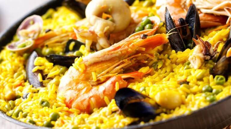 Seafood Paella: A Feast for the Senses and the Soul
Ah, seafood paella—just saying the name makes my mouth water! This iconic Spanish dish is much more than just a meal. It’s a rich cultural experience, bursting with flavors, vibrant colors, and a sense of togetherness. Whether you’re a lifelong foodie, a home cook experimenting in the kitchen, or just someone looking for a healthier, tastier dinner option, seafood paella ticks all the boxes.
But wait, before we get started, I’ve got two little treasures to share with you. First, if you're serious about making paella the authentic way, you need the right tools. Trust me, a good paella pan makes all the difference, and I’ve found one that’ll take your paella game to the next level. Click here to check it out (affiliate alert, but I only recommend the best!). Second, if you’re into healthy recipes, you’ll love this Fat-Burning Cookbook that’s packed with flavor-filled recipes like paella and more. Take a peek at it here!
Now, grab your apron and get ready for a deep dive into all things paella. By the end of this, you’ll not only know how to make this dish like a pro, but you’ll also have healthier (and tastier) alternatives to make it your own.
The Basics of Seafood Paella
Where It All Began
Paella hails from Valencia, Spain, and it’s much more than a dish—it’s a tradition. Historically, it was prepared outdoors, cooked over an open fire, and shared among family and friends. The word "paella" comes from the Old French "paelle," which means pan, so yes, the pan is kind of a big deal here.
While paella has evolved with time, its essence remains the same—a harmonious blend of fresh ingredients cooked to perfection.
Essential Ingredients (and Why They Rule)
At its core, seafood paella is a simple dish. Yet, each ingredient plays a starring role. Here’s what you’ll need:
Rice: Traditional paella calls for short-grain rice because it absorbs liquid without becoming mushy. Bomba rice is the star!
Seafood: From prawns and mussels to squid and fish, seafood options are endless. And bonus—seafood is packed with omega-3 fatty acids.
Saffron: This golden spice is non-negotiable. It gives the rice its signature color and a subtle floral flavor.
Vegetables: Bell peppers, tomatoes, and peas are common additions that boost color and nutrition.
Stock: Robust seafood or chicken stock is key to infusing that irresistible depth of flavor.
Step-By-Step Guide to Making Seafood Paella
Prep Your Ingredients:
  Chop your veggies, clean your seafood, and measure out the perfect ratio of rice to broth (usually 1 cup of rice to 2.5 cups of stock).

Sear Your Seafood:
  Heat your paella pan (did you check out the one I linked before? 😉) with olive oil. Quickly sear your seafood, then set it aside—it’ll finish cooking later.
Build the Base:
  Sauté onions, garlic, and tomatoes in olive oil. Stir in paprika and saffron for that dreamy flavor.
Add Rice & Stock:
  Mix the rice into the base and pour your stock over. Pro Tip: Never stir paella once you’ve added the liquid. Let the rice cook undisturbed to develop the coveted crispy "socarrat" layer at the bottom.
Arrange Seafood:
  Scatter your seafood back into the pan as the rice cooks—this helps them stay tender and locks in all that juicy flavor.
Rest & Serve:
  Once the liquid is fully absorbed and the rice is cooked, remove from heat, cover with foil, and let it rest for 5 minutes before serving.
Voila, you’ve just made paella like a true Spaniard!
Health Benefits of Seafood Paella
A Nutritional Powerhouse
Seafood is a low-calorie, high-protein champ. Mussels are packed with iron, prawns are rich in selenium, and squid brings zinc to the plate. All that goodness, and none of the guilt!
The Mediterranean Difference
Seafood paella is rooted in the Mediterranean diet, which is hailed as one of the healthiest in the world. With its heart-healthy fats, lean proteins, and fresh produce, this dish nourishes your body and soul.
Tips to Make It Healthier
Use brown rice for extra fiber and nutrients.
Swap out regular olive oil for extra-virgin olive oil to maximize antioxidants.
Load up on veggies like zucchini, asparagus, or artichokes for added vitamins.
Reduce sodium by opting for low-sodium stock or making your own.
Tools of the Trade
No great paella is complete without the right tools. A traditional paella pan ensures even cooking and perfect texture. And if you’re serious about recreating that authentic experience, a paella burner is a worthy investment.
Top Product Picks:
Authentic Carbon Steel Paella Pan: A true game-changer for even cooking.
Fat-Burning Cookbook: You’ll find recipes here that perfectly complement your paella night.
Paella Burner for Outdoor Cooking: Ideal for capturing those traditional Valencian vibes.
Incorporating Fat-Burning Recipes
This wouldn’t be a food blog without mentioning how you can keep things healthy. Enter the Fat-Burning Cookbook, your ultimate sidekick for guilt-free indulgence.
Here are a few ways to infuse these recipes into your paella experience:
Paella with a Twist: Incorporate low-calorie ingredients like lean chicken or turkey instead of traditional proteins.
Pairing Perfection: Serve your paella with detoxifying salads or fat-burning soups featured in the cookbook.
Dessert Done Right: Round off your paella feast with a healthy, satisfying sweet treat from the cookbook.
Grab your copy here and explore a treasure trove of recipes that boost your metabolism without sacrificing flavor!
Making Seafood Paella Your Own
Once you’ve mastered the basics, the real fun begins. Here’s how you can get creative:
For Vegetarians: Skip the seafood and opt for a veggie-loaded version with mushrooms, edamame, and artichokes.
For Spice Lovers: Add chorizo or a touch of cayenne for a fiery kick.
For Wine Pairing Enthusiasts: Pair your paella with a crisp white wine like Albariño or a fruity sangria for a Spanish-themed dinner.
Tip for experimentation—paella always tastes better when enjoyed with friends and family.
Spice Up Your Dinner Table Tonight!
Seafood paella is more than just food—it’s an experience. With its roots in tradition and adaptability to modern tastes, it’s the perfect dish to bring people together.
Now it’s your turn! Whip up a seafood paella, snap a pic, and drop your creation in the comments. Got tips or creative variations? Share those too. And don’t forget to grab your paella pan and Fat-Burning Cookbook to start your healthy, flavorful cooking adventures today.
Happy cooking!

Seafood Paella
